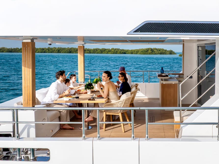 Al fresco dining on the Nomad 101 upper deck
