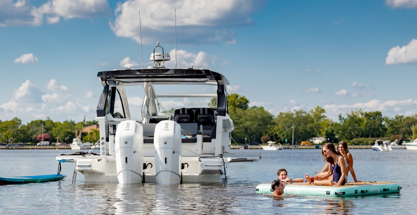 375 GTO transom with twin Mercury outboards and swim floats