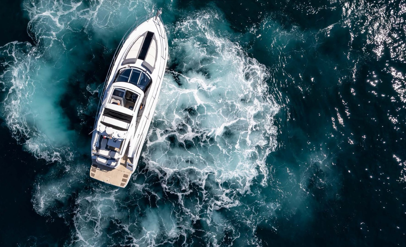 Aerial view of the 405 HTS underway on turquoise water