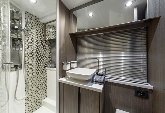 470 SKY bathroom with mosaic-tiled shower