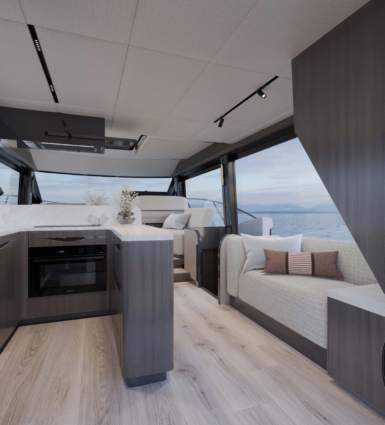 Main saloon with open galley island and sea-view sofa