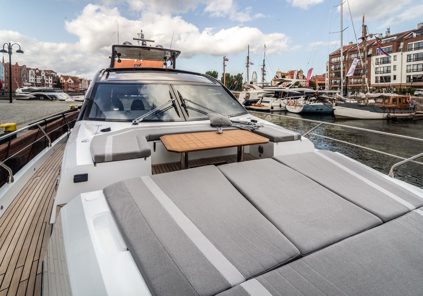 700 SKY foredeck sunpads and wooden table