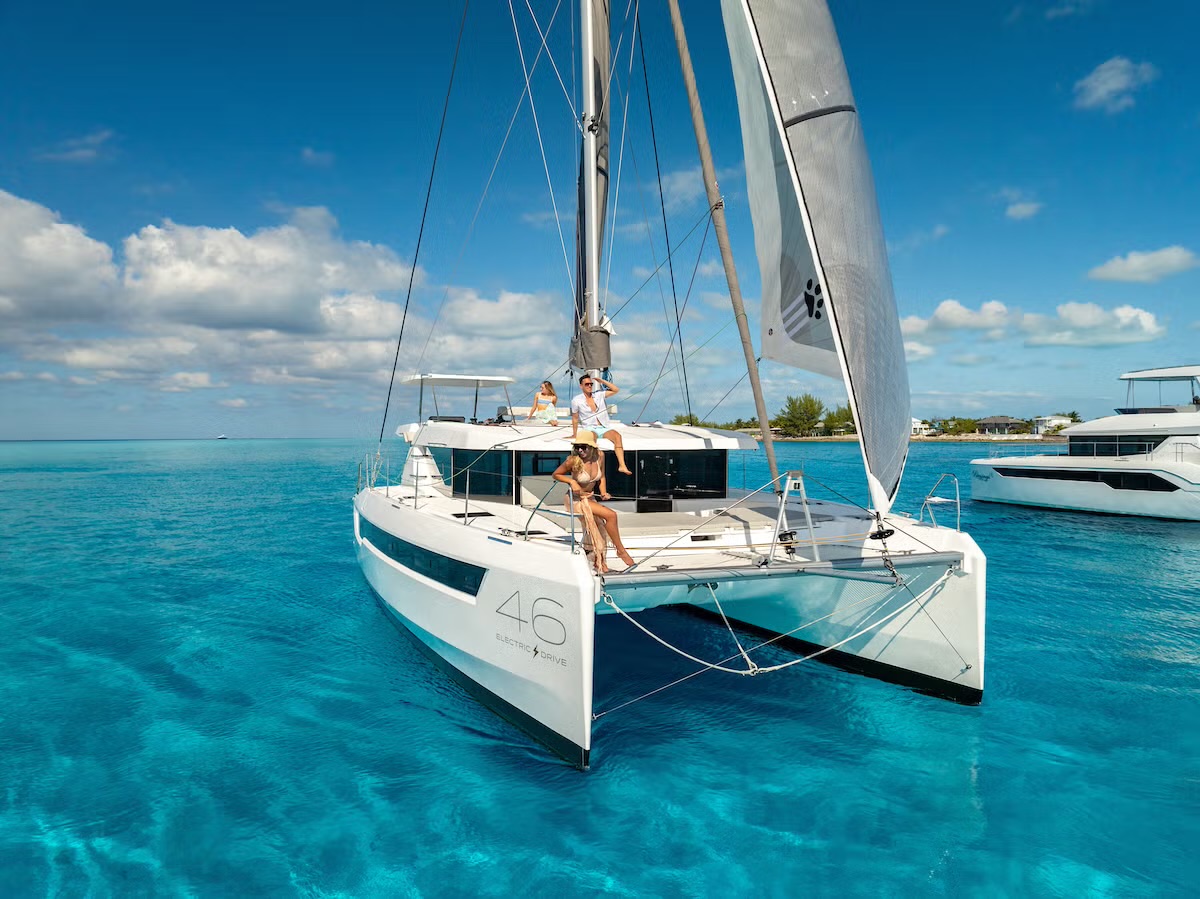 Leopard 46 bow view with guests relaxing on the foredeck