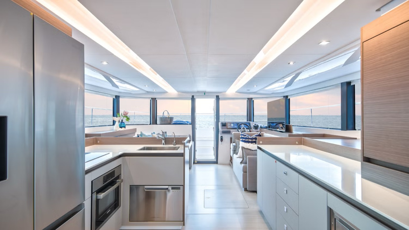 46PC flybridge helm and dinette under the hardtop