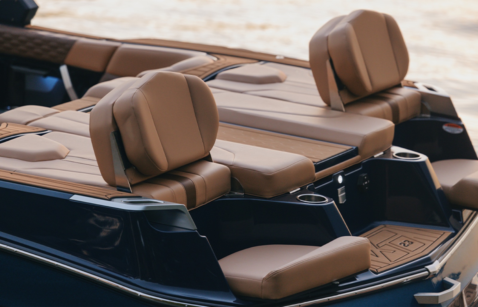 XT23 flip-up transom sun pad and seating