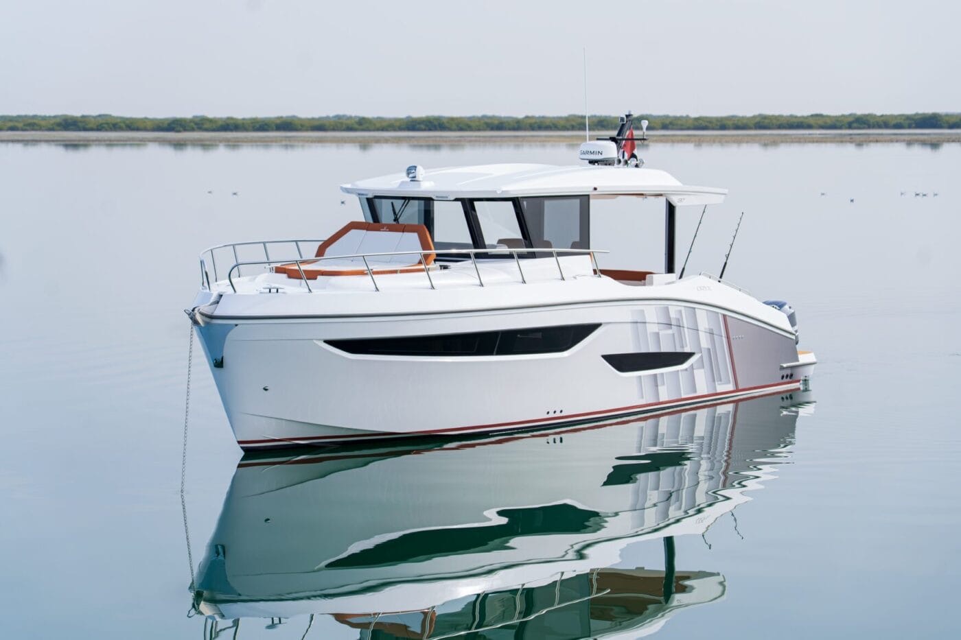 37FX bow profile at anchor on calm water