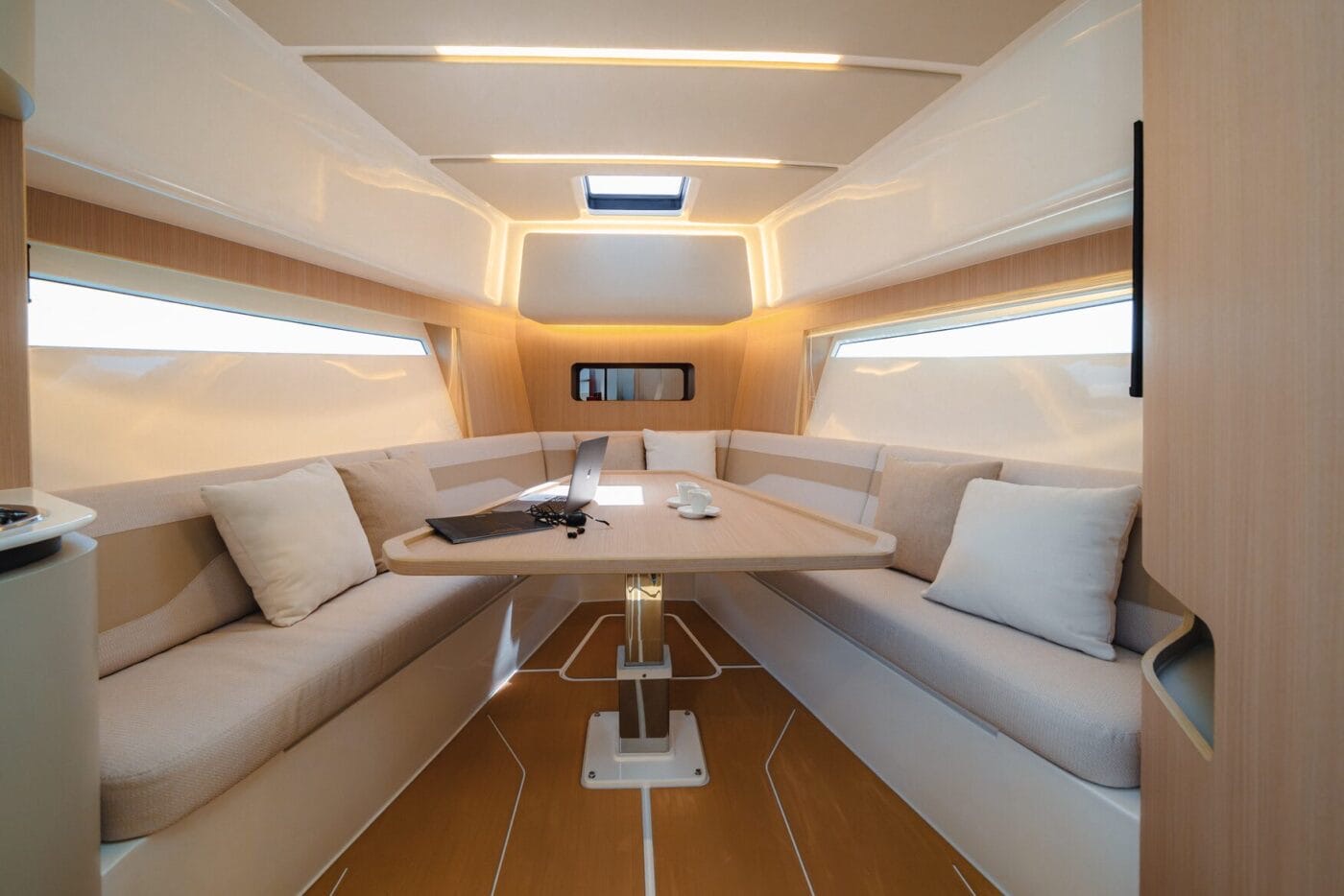 37LX cabin wrap-around settee and table