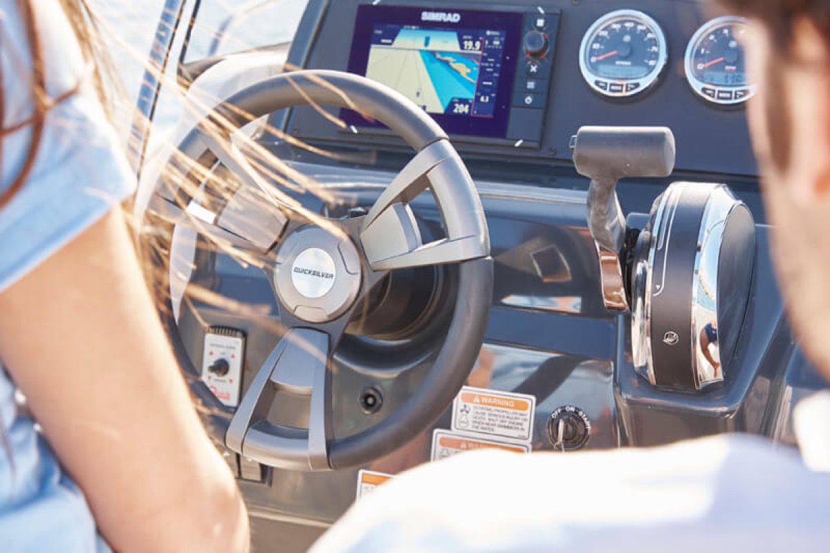 Helm station with Simrad navigation display