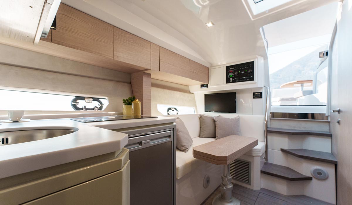 C3X IB lower-deck galley and dinette with companionway steps