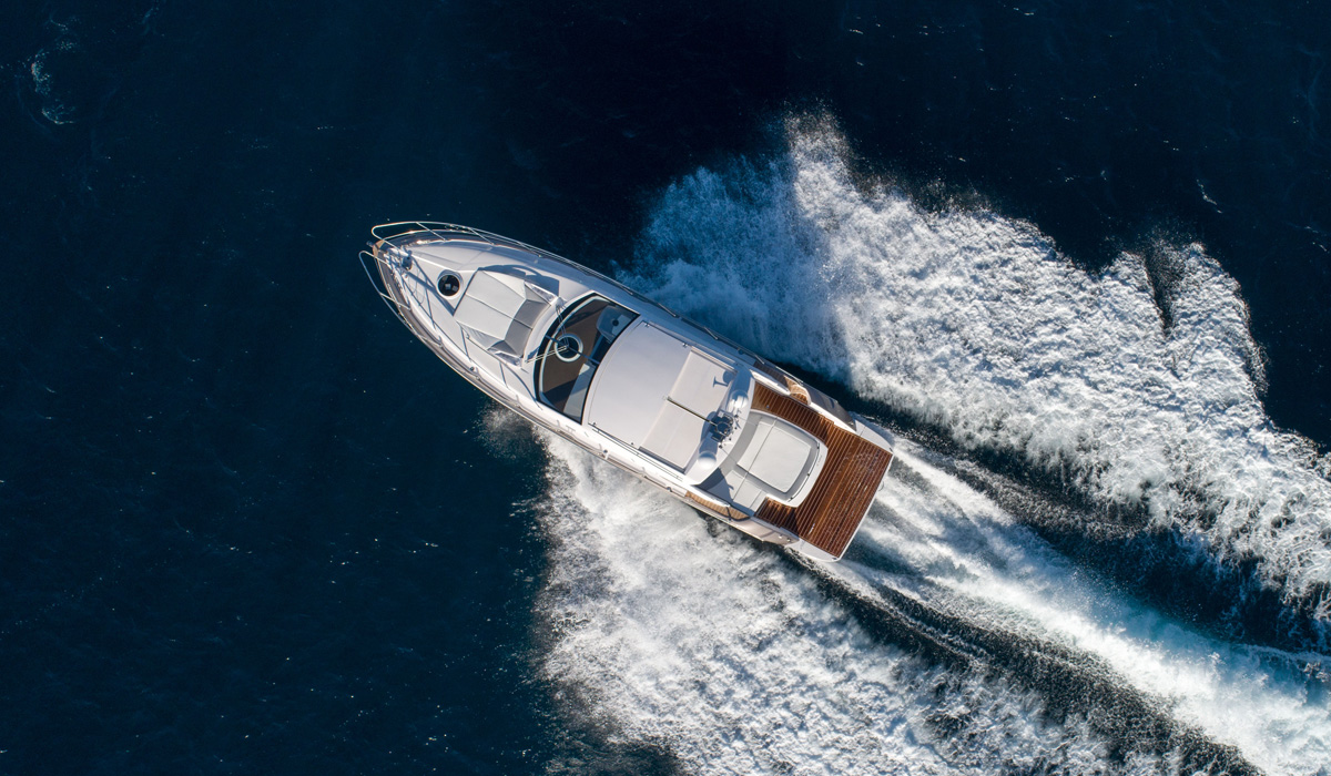 Aerial view of the C44 carving through dark water