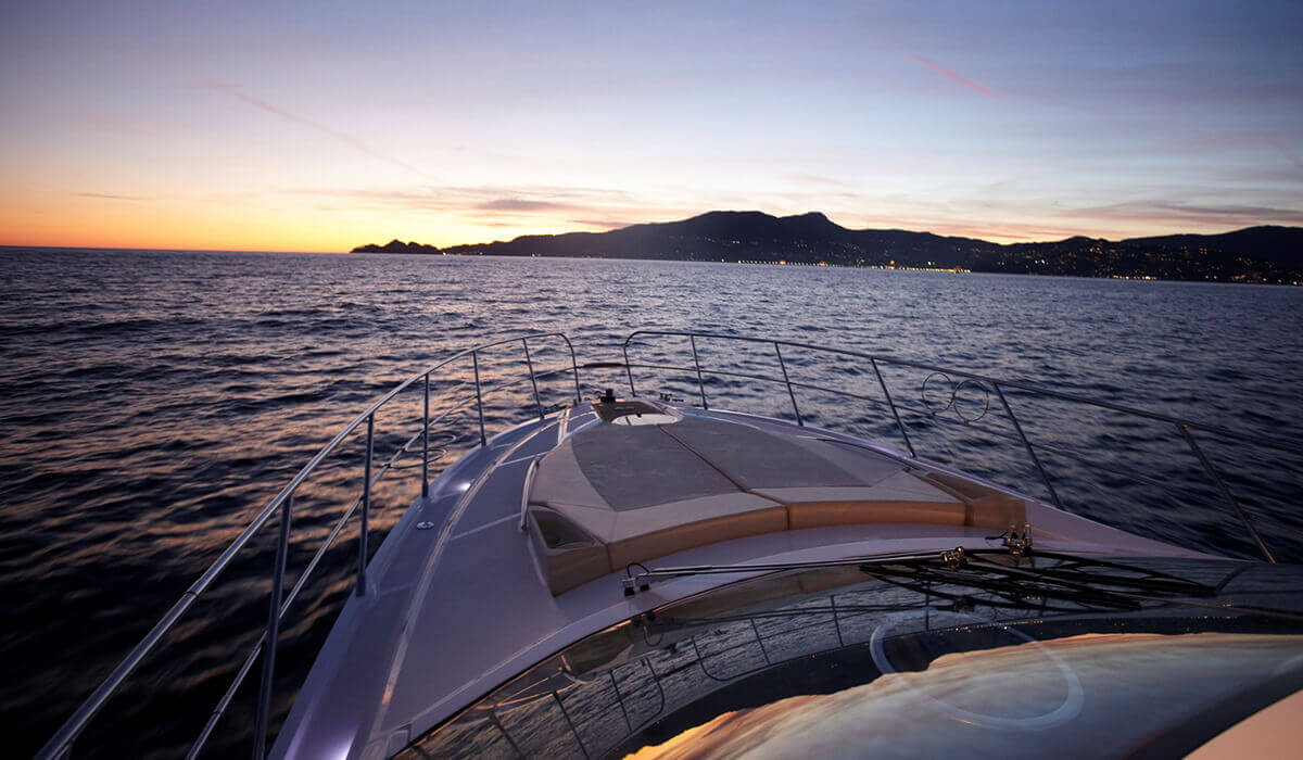 C48 bow sunpad at sunset