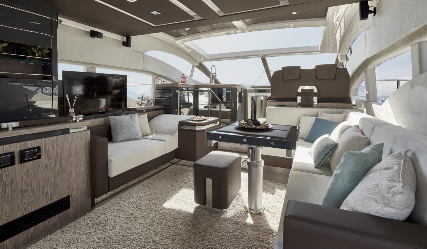 Main saloon with panoramic skylight and facing sofas