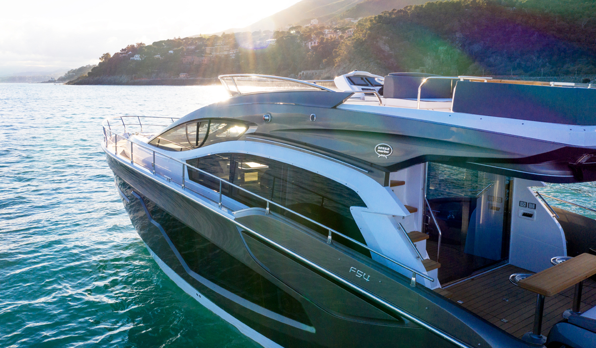 Fly 54 hull-side close-up at sunset